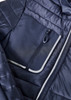 A navy unisex patrol jacket featuring a zippered chest pocket and quilted design. Logos are visible on the jacket.