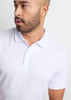 A short sleeve polo shirt in white, featuring a collar and a branding logo on the chest.