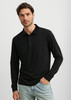 A black long sleeve polo shirt for men featuring a collar and button placket, with a model wearing it.