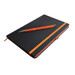 A black notebook with an orange elastic band and an orange pen resting on top. The notebook has a logo. A black notebook with an orange elastic band and an orange pen resting on top. The notebook has a logo.