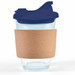 A reusable coffee cup with a navy snap lid and a cork band wrapped around a clear glass body. A reusable coffee cup with a navy snap lid and a cork band wrapped around a clear glass body.