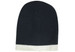 A two-tone cable knit beanie in dark blue with a light grey cuff, featuring a logo.