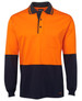 A long-sleeved cotton polo shirt featuring orange and navy panels, with a collar and a chest pocket, plus branding.