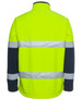 A high-visibility three-layer softshell jacket in bright yellow with navy sleeves and reflective strips.