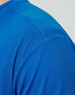 A close-up of a men's ultra lightweight performance T-shirt in vibrant blue, featuring a textured fabric.