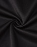 A close-up of black fabric, showcasing a smooth, textured surface suitable for a polo shirt.
