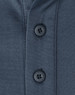A close-up of a men's sustainable poly/cotton polo shirt in a dark colour, featuring two black buttons at the collar.