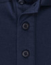 A navy blue polo shirt featuring a button placket and a logo. The fabric is a sustainable poly/cotton blend.