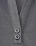 A grey sustainable poly/cotton polo shirt featuring a placket and two buttons. The shirt includes a logo.