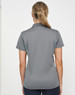 A grey women's polo shirt with blue contrast detailing and a collar, featuring a logo on the back.