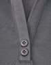 A grey sustainable poly/cotton polo shirt featuring a placket and two buttons. The shirt includes a logo.