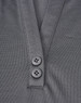 A grey polo shirt featuring a two-button placket and a logo. The fabric is a sustainable poly/cotton blend.