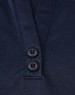 A navy blue polo shirt featuring a two-button placket and a logo. The material is a sustainable poly/cotton blend.