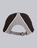 A cap featuring a tri-colour design with black, grey, and white accents. The back has an adjustable strap and a branding logo.