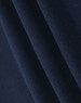 A close-up of soft, dark navy fabric, highlighting its smooth texture and folds.