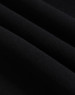 A close-up of black polar fleece fabric, showcasing its soft texture and layering. The image features a logo.