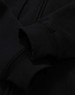 A black men's full-zip fleecy hoodie featuring cuff details and a logo.