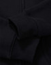A black full-zip fleecy hoodie with a smooth fabric texture and a close-up view of the sleeve.