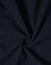 A navy softshell fabric with a smooth, textured finish, featuring a spiral pattern at the centre.