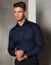 A navy blue men's button-up shirt with long sleeves and a pocket, featuring a subtle striped design.