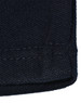 A close-up of a dark navy knit fabric with a hemmed edge, showcasing the texture and stitching details.