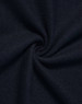 A close-up of dark navy fabric, showcasing a textured, woven pattern.