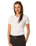 A white ladies' polo shirt with a v-neck and short sleeves, paired with black trousers. The model is smiling and wearing a belt.