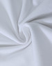 A close-up view of soft, white cotton fabric, showcasing a smooth and stretchy texture.