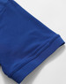 A close-up of a blue polo shirt sleeve featuring a smooth hem and textured fabric. The shirt has a logo on it.