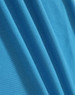 A close-up of smooth, vibrant blue fabric, showcasing the texture and quality of the material.