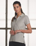 A light grey ladies' polo shirt with a collar and a button placket, featuring a logo on the side.