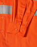 An orange work shirt with reflective stripes and buttons, featuring a long sleeve and a fitted cuff.
