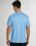 A blue short sleeve tee with a textured fabric and a logo on the back.