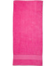A pink terry velour beach towel, sized 75x150 cm, featuring a solid design and a subtle logo.