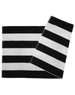 A striped beach towel in black and white with a logo, featuring alternating bold stripes.