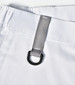 A close-up of a white unisex utility stretch cargo work pant featuring a silver loop and waistband detail.