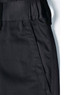 Unisex black utility stretch cargo work pants featuring an elastic waistband and side pockets. Includes branding.