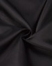 A close-up of black fabric with a smooth texture, showcasing its sheen and drape.