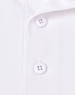 A close-up of a white sustainable polo shirt featuring two buttons and a collar. The shirt includes a logo.