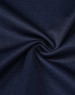 A close-up view of dark navy fabric with a smooth texture, featuring a twist. The material appears soft and breathable.
