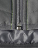 A quilted grey safety jacket with reflective stitching and a zipper detail at the front, including a logo.