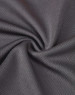 A black, textured fabric showcasing a breathable mesh pattern, suitable for work polo shirts. Includes a logo.