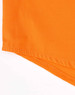 An orange closed front long-sleeve shirt with perforated tape detail and a branding logo.