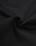 Black cotton stretch ripstop fabric featuring a textured weave, suitable for workwear applications.