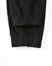 Cuffed work pants in black cotton stretch drill fabric, featuring a comfortable, fitted design.
