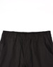 Black unisex cotton stretch drill cuffed work pants featuring an elastic waistband and pockets.