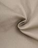 A close-up of beige fabric showcasing the texture of cotton stretch drill material. The image features a subtle shine.