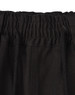 A close-up of the waistband of black unisex cotton stretch drill work shorts, featuring an elastic band and drawstring.