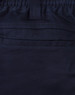 A close-up of navy unisex cotton stretch drill work shorts, featuring an elastic waistband and stitching details.