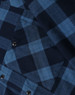 A unisex flannel plaid shirt in navy and blue tones, featuring button-up design and a chest pocket.